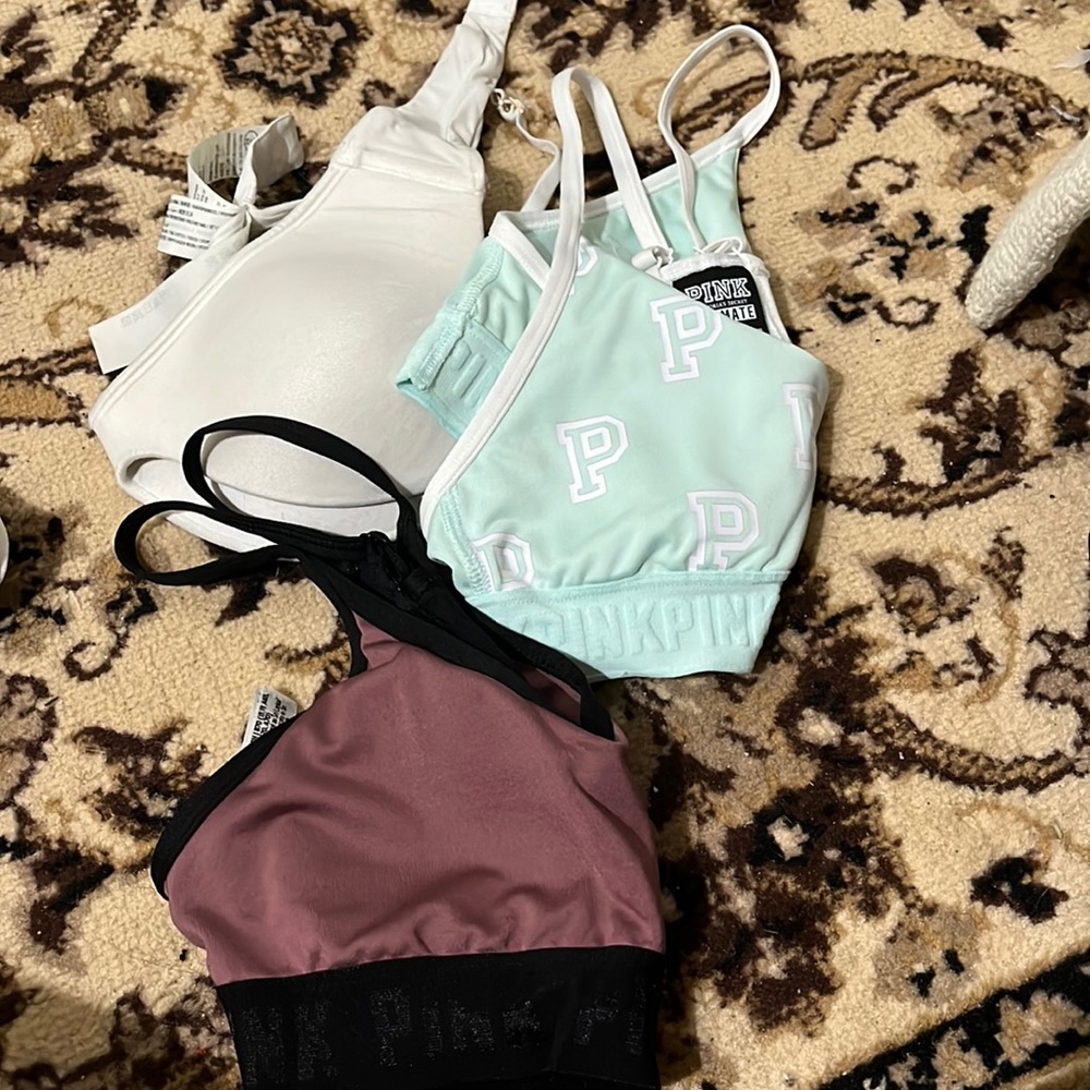 3 piece 1 Hollister white bra, 2 pink sports bra.